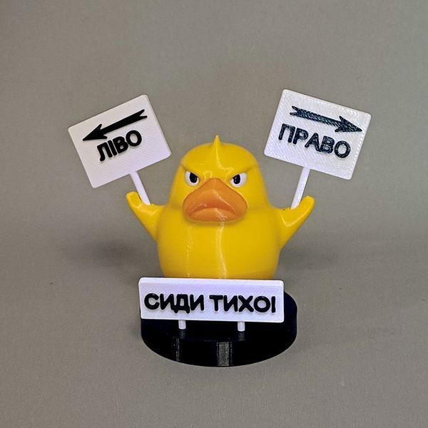 Іграшка на торпеду авто "Жовта качка", 5 см, пластик/3д фігурка в машину на панель 1372-455 фото